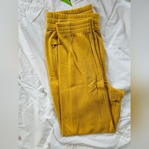 Fabletics NWT mustard yellow/ gold women's joggers.  Size M